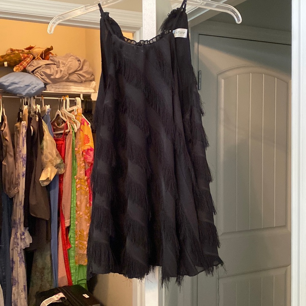 Pants Store black fringed top.